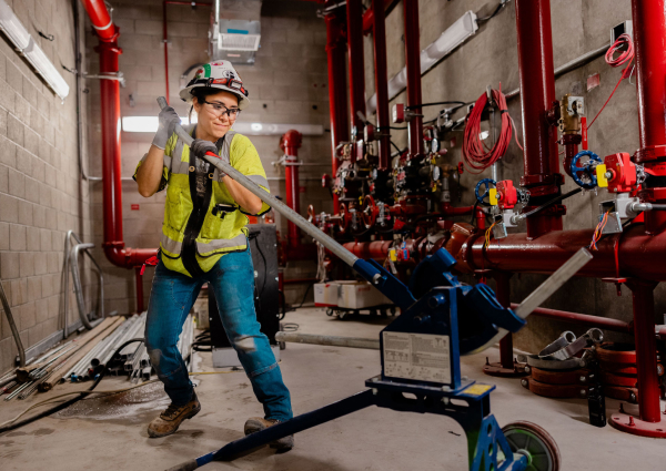 A person working with a piece of heavy equipment.